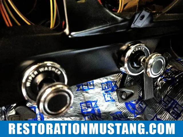 Head light switch bezel retaining nut and washer | Fitting a 70 mustang switch bezel on a 71 72 or 73 Ford Mustang. This seems to be a topic affecting a lot of fellow mustang restorers out there. Currently, the aftermarket does not remanufacture switch bezels for the 71-73 mustangs. The do however make them for the 69-70 mustang and at first glance they look similar. They couldn’t be less compatible with the 71-73 if they tried… The first problem you will need to correct is the tabs that come supplied on the bezels. These will need to be ground off of the bezel. Next, be certain that you do not mess up your original bezel retaining nuts, these are impossible to find on the aftermarket and are essential for this project to be a success. For my project mustang, I simply sanded these town to a smooth finish and sprayed mine satin black. It makes for a cleaner appearence and lets the bezels really shine in the dash panel. Moderate Install DifficultyOnce all the bezels are ground down and lay flat at the back, you will notice that the headlight switch bezel retaining nut’s head is too small to fit into the new headlight switch bezel. This does not seem like a huge problem, but it is… You will need to head over to northern tool supply or get online and find a machine bushing that measures 5/8 x 1 x 18ga. This is the perfect size to fit into the new bezel and provide a nice surface for the bezel retaining nut to attach. Your next dilemma will be that with the new setup, your bezel retaining nut is about 1/4″ too short to re-thread into the headlight switch once the back spacer is placed between the switch and the inside of the dash frame. I tried numerous solutions to solve this problem, but the angle of the dash panel is too odd for the switch to tighten down properly. The solution is to recess the face of the back spacer approx 1/4″ so that the switch becomes closer to the bezel retaining nut. To do so, I simply hit it gently with a mallet to recess inward. There are better methods to do this, but this does work just fine. The last issue you will run into is that the new headlight switch knob and stem for the 69-70 mustang is 1/2″ too short to make contact inside the headlight switch. You will need to gently pull the knob off of the new stem and refurbish your original headlight switch stem. Once you do all of this, viola! The setup looks new and fancy!