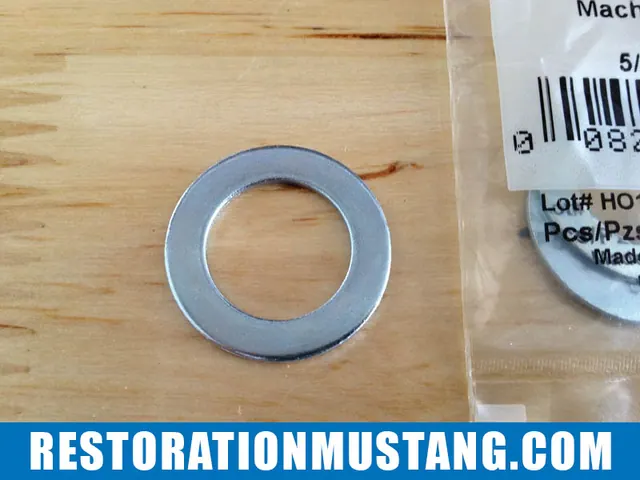 Head light switch bezel retaining nut and washer | Fitting a 70 mustang switch bezel on a 71 72 or 73 Ford Mustang. This seems to be a topic affecting a lot of fellow mustang restorers out there. Currently, the aftermarket does not remanufacture switch bezels for the 71-73 mustangs. The do however make them for the 69-70 mustang and at first glance they look similar. They couldn’t be less compatible with the 71-73 if they tried… The first problem you will need to correct is the tabs that come supplied on the bezels. These will need to be ground off of the bezel. Next, be certain that you do not mess up your original bezel retaining nuts, these are impossible to find on the aftermarket and are essential for this project to be a success. For my project mustang, I simply sanded these town to a smooth finish and sprayed mine satin black. It makes for a cleaner appearence and lets the bezels really shine in the dash panel. Moderate Install DifficultyOnce all the bezels are ground down and lay flat at the back, you will notice that the headlight switch bezel retaining nut’s head is too small to fit into the new headlight switch bezel. This does not seem like a huge problem, but it is… You will need to head over to northern tool supply or get online and find a machine bushing that measures 5/8 x 1 x 18ga. This is the perfect size to fit into the new bezel and provide a nice surface for the bezel retaining nut to attach. Your next dilemma will be that with the new setup, your bezel retaining nut is about 1/4″ too short to re-thread into the headlight switch once the back spacer is placed between the switch and the inside of the dash frame. I tried numerous solutions to solve this problem, but the angle of the dash panel is too odd for the switch to tighten down properly. The solution is to recess the face of the back spacer approx 1/4″ so that the switch becomes closer to the bezel retaining nut. To do so, I simply hit it gently with a mallet to recess inward. There are better methods to do this, but this does work just fine. The last issue you will run into is that the new headlight switch knob and stem for the 69-70 mustang is 1/2″ too short to make contact inside the headlight switch. You will need to gently pull the knob off of the new stem and refurbish your original headlight switch stem. Once you do all of this, viola! The setup looks new and fancy!